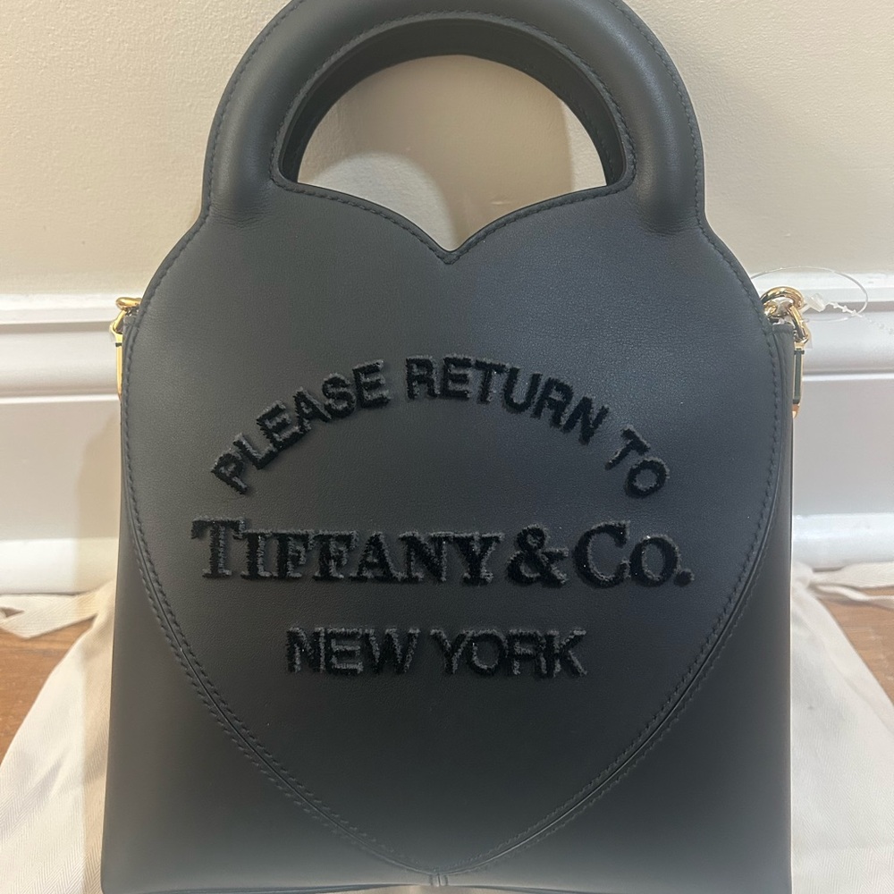 NWOT Tiffany & Co. Black Heart-Shaped mini purse with gold chain. Pristine!
